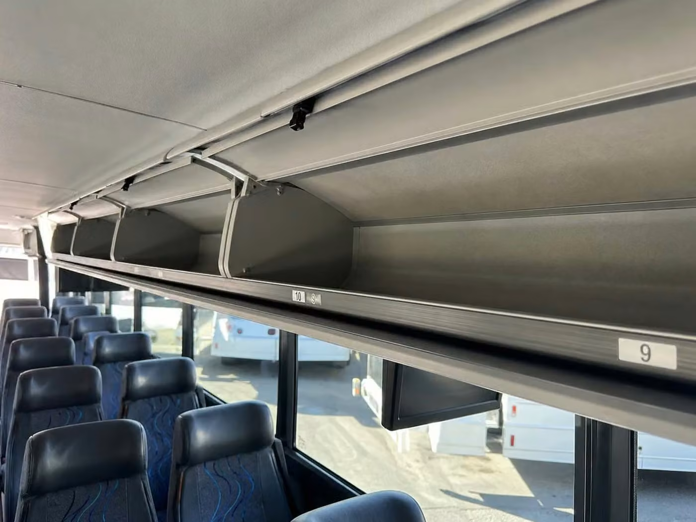 celina 18 passenger minibus overhead storage