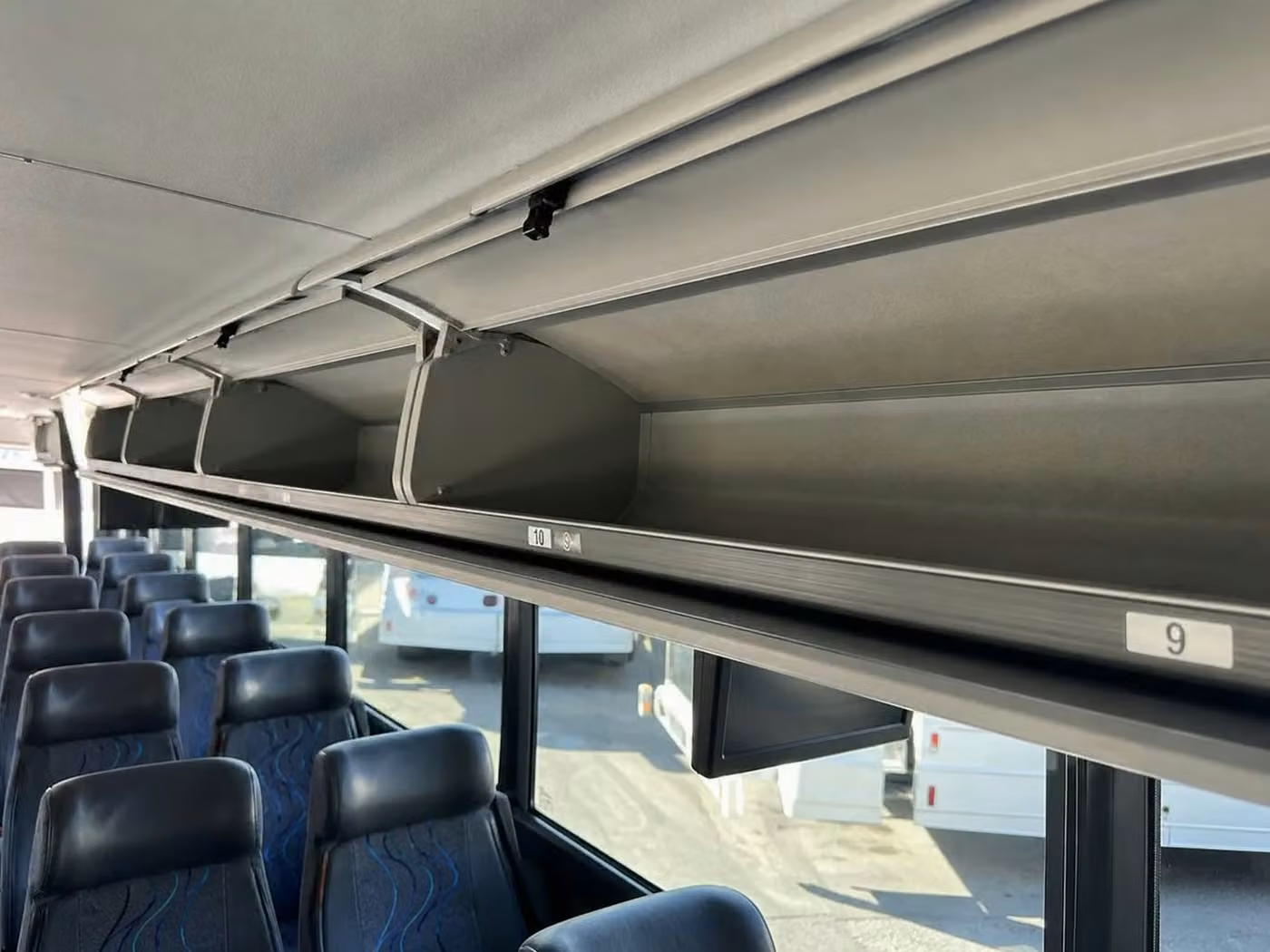 celina 28 passenger minibus overhead storage
