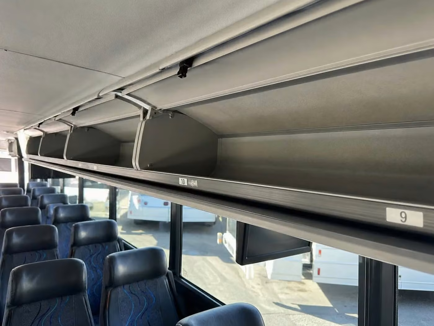 celina 35 passenger minibus overhead storage
