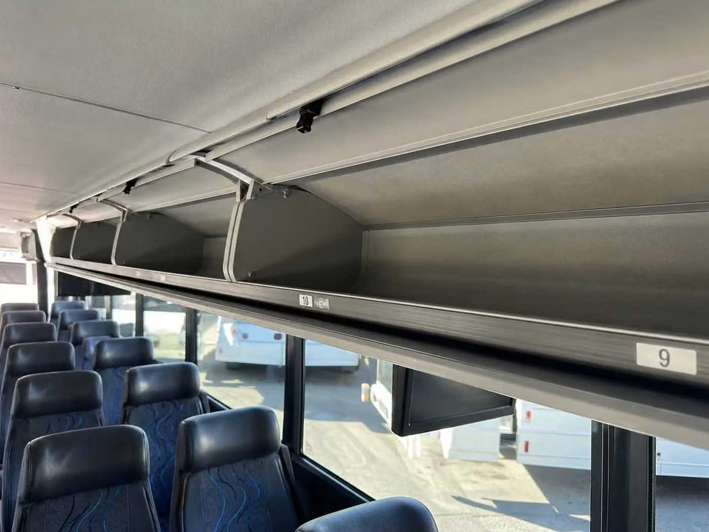 celina 56 passenger charter bus overhead storage