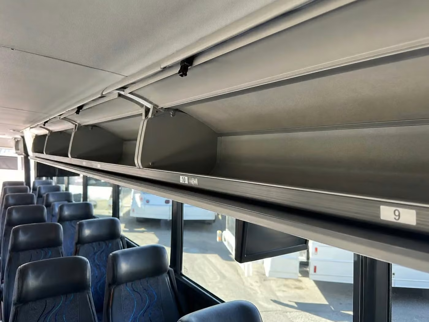 celina charter bus overhead storage